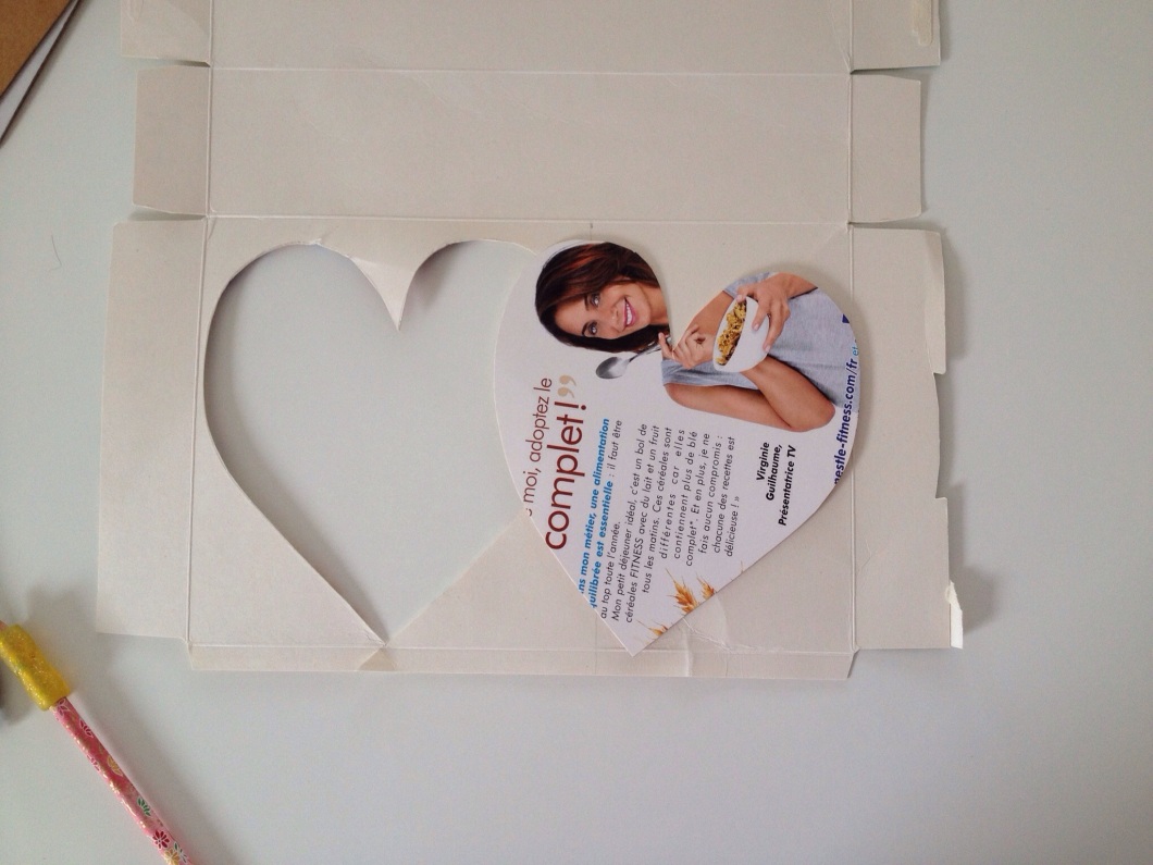 Cut out a large heart from a cereal box.
