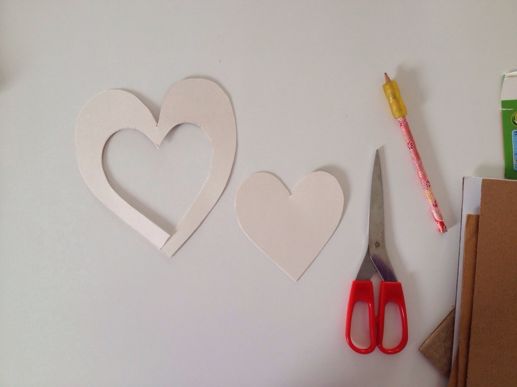 cut out a small heart from the large one