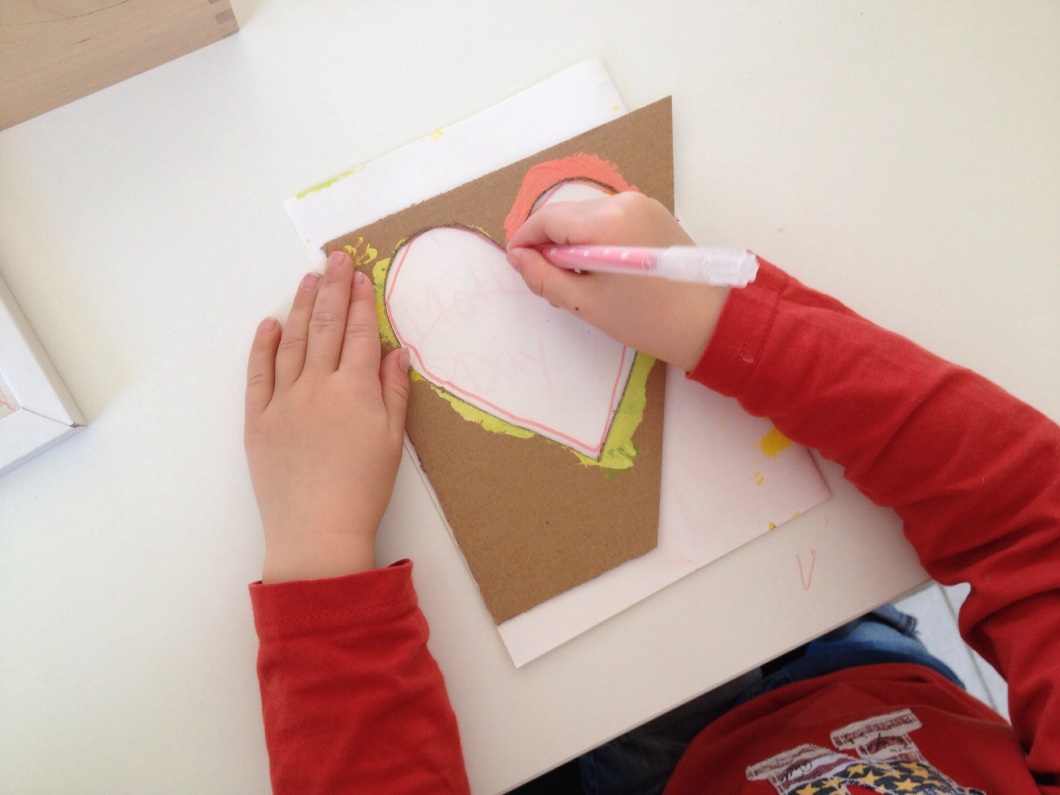 Use the stencils that you used to make your heart decoration on your card.
